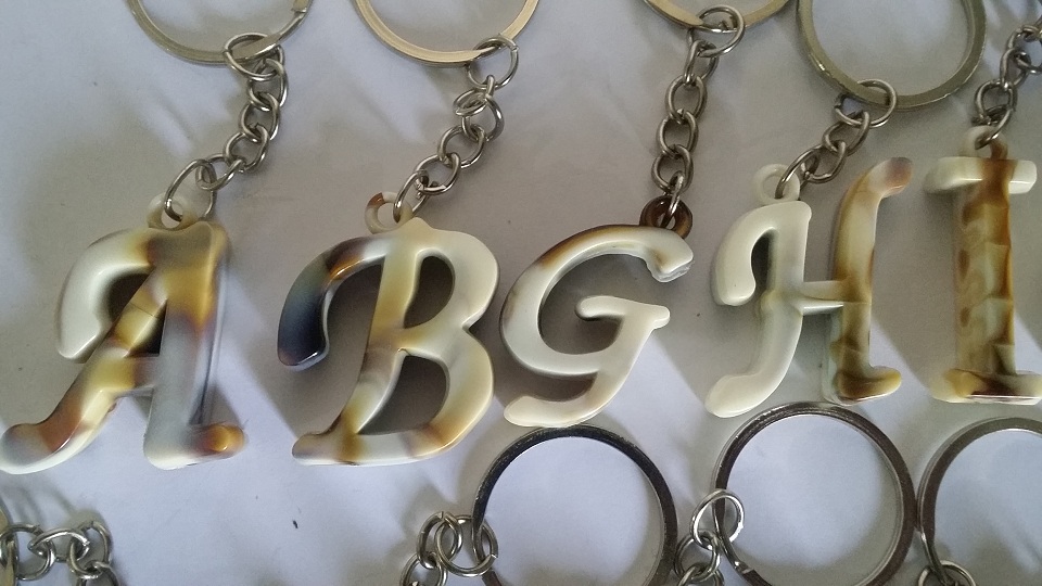 Pack of Two Key Chains - Beautiful English Letters